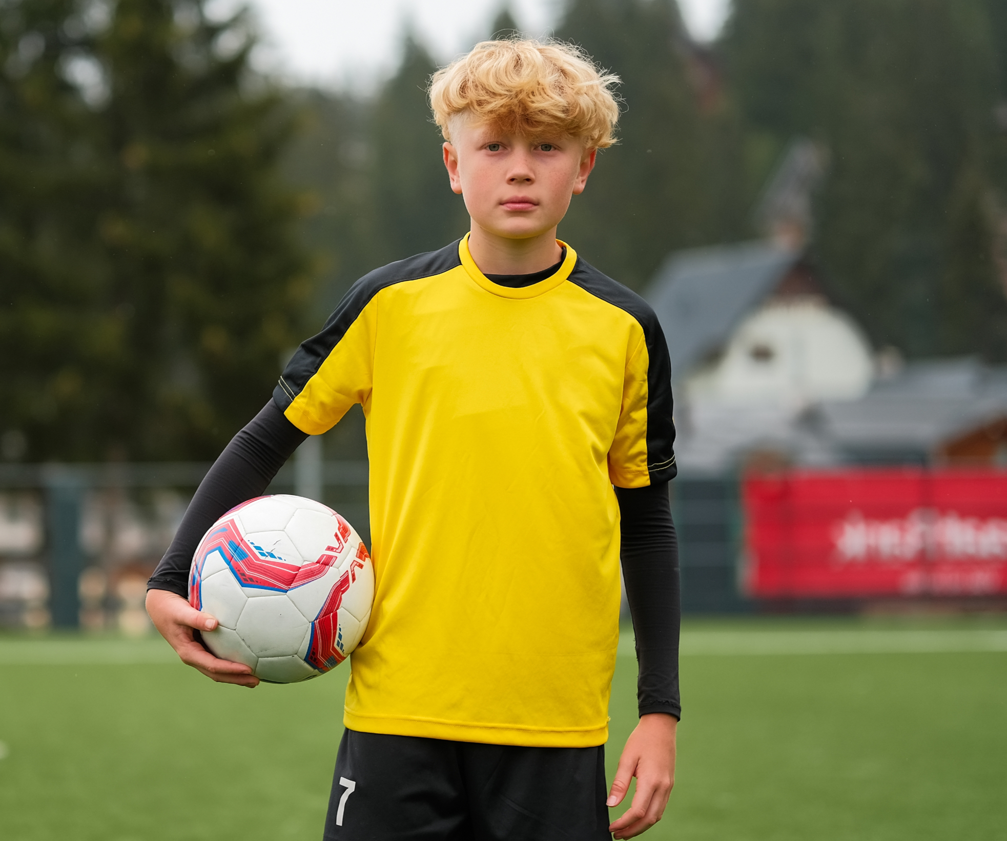 portrait-kid-boy-soccer-player-football-field-with-soccer-ball-her-hand_edited.jpg