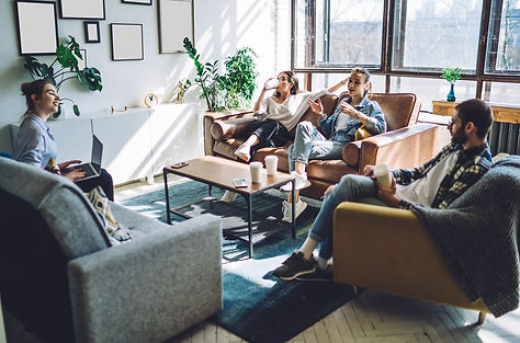 People relaxing in a living room
