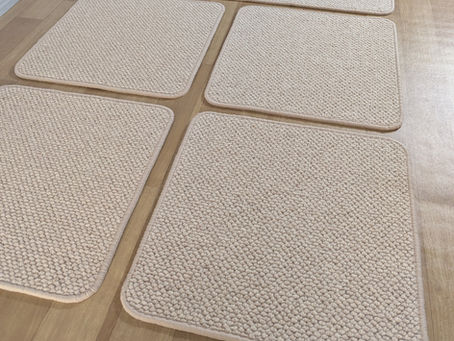 Five custom-sized wool mats overlocked