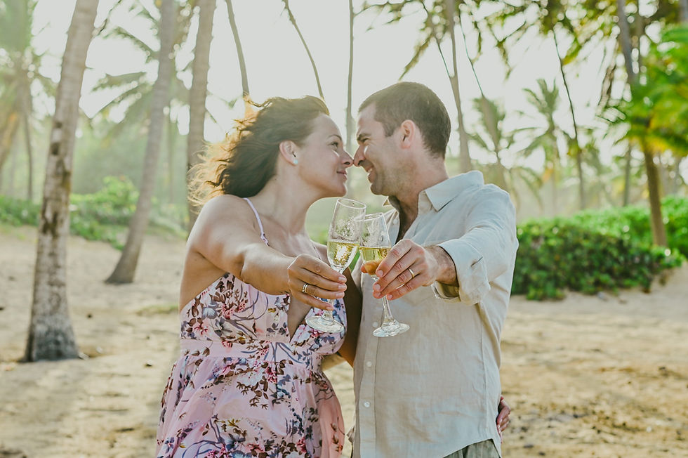 Couple celebrating their 25th wedding anniversary after renewing their vows on a Caribbean beach