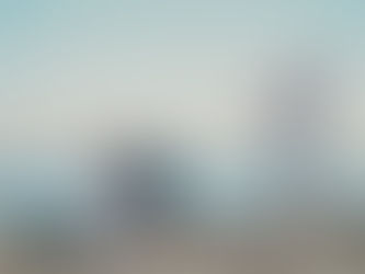 Beach marriage proposal in Punta Cana with live saxophonist, engaged couple sitting on a wooden log by the sea celebrating their engagement