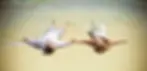 Punta Cana photographer capturing a romantic couple lying on the beach during a photo shoot
