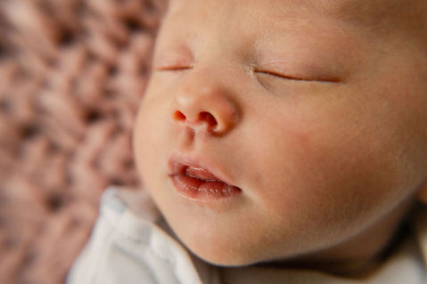 newborn baby girl's nose and lips