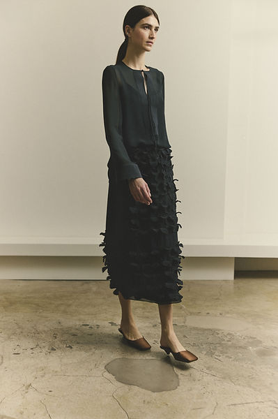 Ink silk georgette and bonded duchess blouse & petal skirt - front view of model walking.jpg