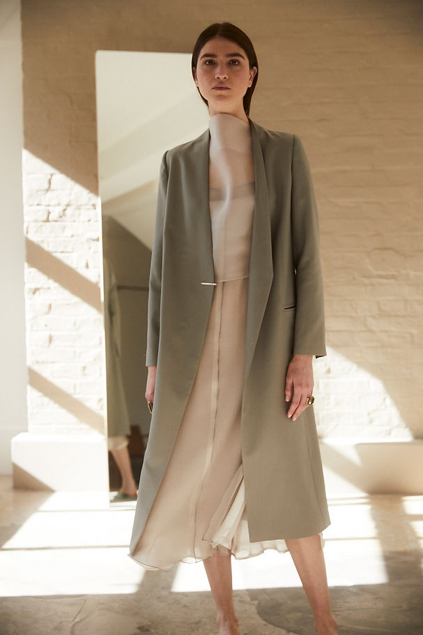 Tailored Wool Coat with Hammered Silver Fastening. Cowl Neck Organza & Chiffon Layered Dress.