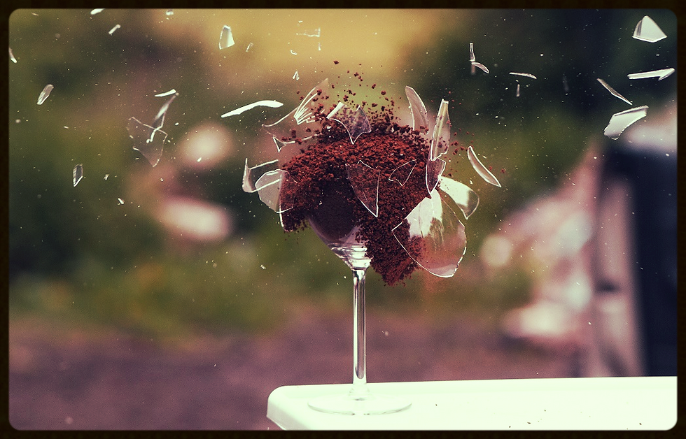 Exploding Wine glass Filled With Dried Coffee_edited.jpg