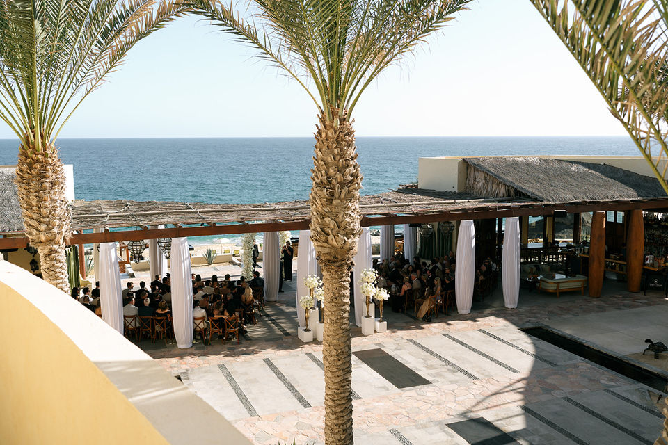 Oceanview terrace wedding reception at Cabo San Lucas destination venue.