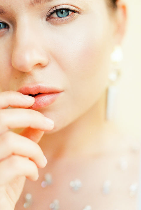 Close-up of natural bridal makeup with soft glowing skin