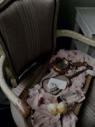 vintage chair with wedding details displayed