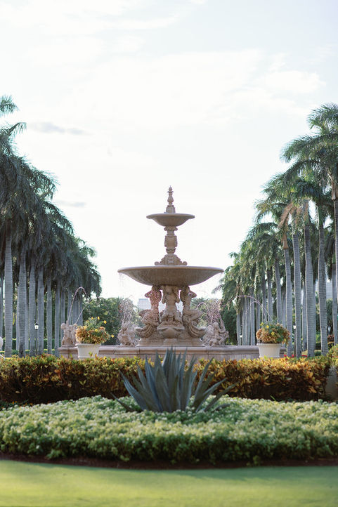 Wedding fountain garden at The Breakers Palm Beach, elegant outdoor ceremony spot.