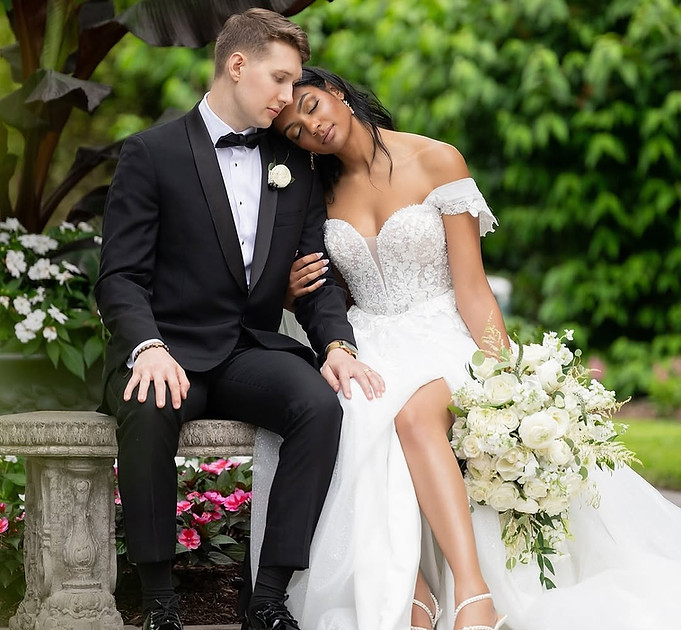 bride and groom sitting together after wedding ceremony with natural bridal makeup