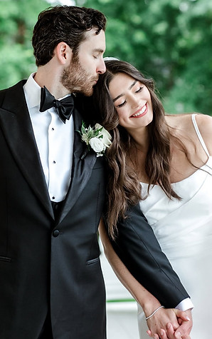 happy couple walking together after wedding with bride wearing natural makeup
