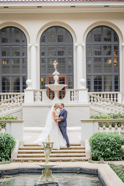Bride and groom outside the Breakers Palm Beach.