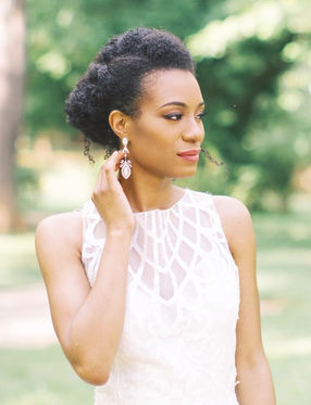 Destination African American bride with polished bridal hair and makeup