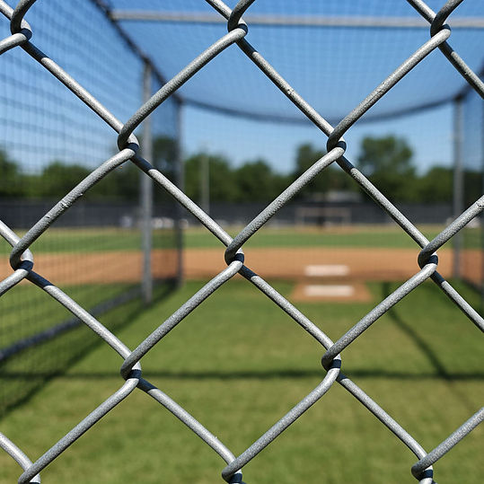 Chain Link Fence installed around a little league baseball field.