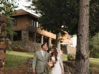Wedding couple walking down the Foote Path at North Star House on their spring wedding day in May