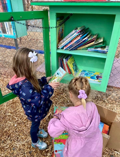 Helping Dig It refill the Children’s Little Free Library. It’s a popular place to take a book, bring a book!