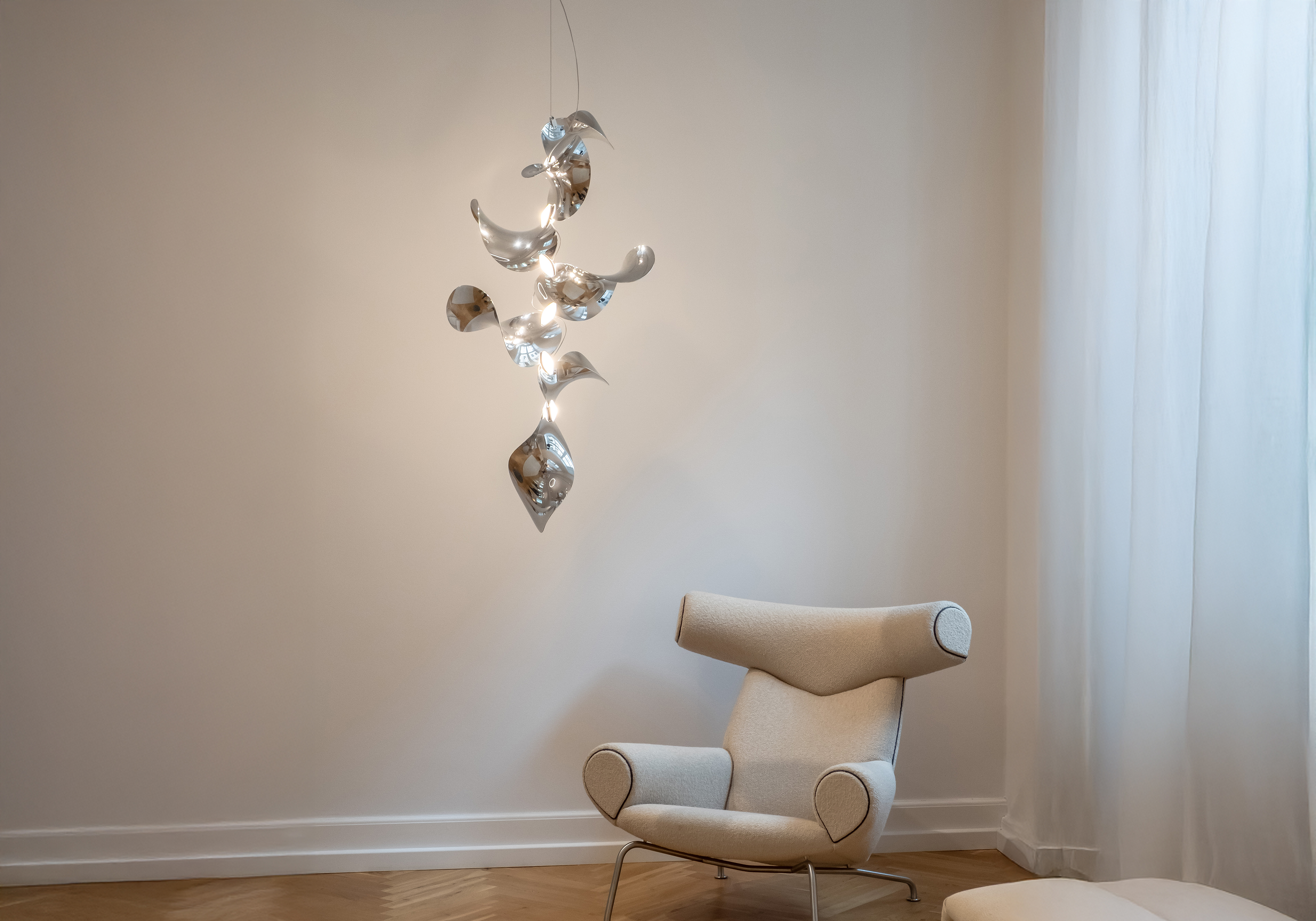 MOSS Objects pendant lighting in restaurant interior showing scale and proportion