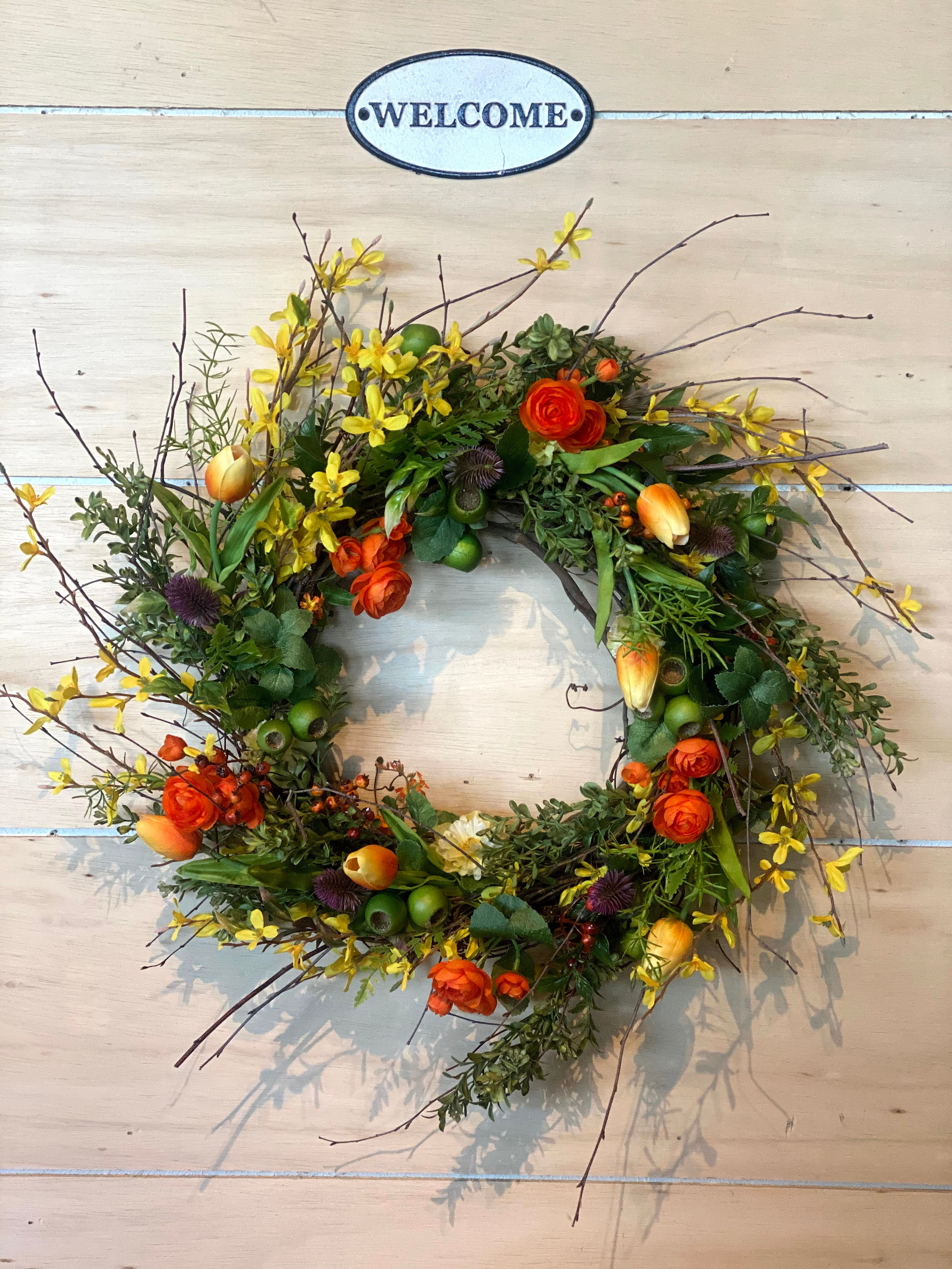 Yellow Forsythiaand Orange Ranunculus