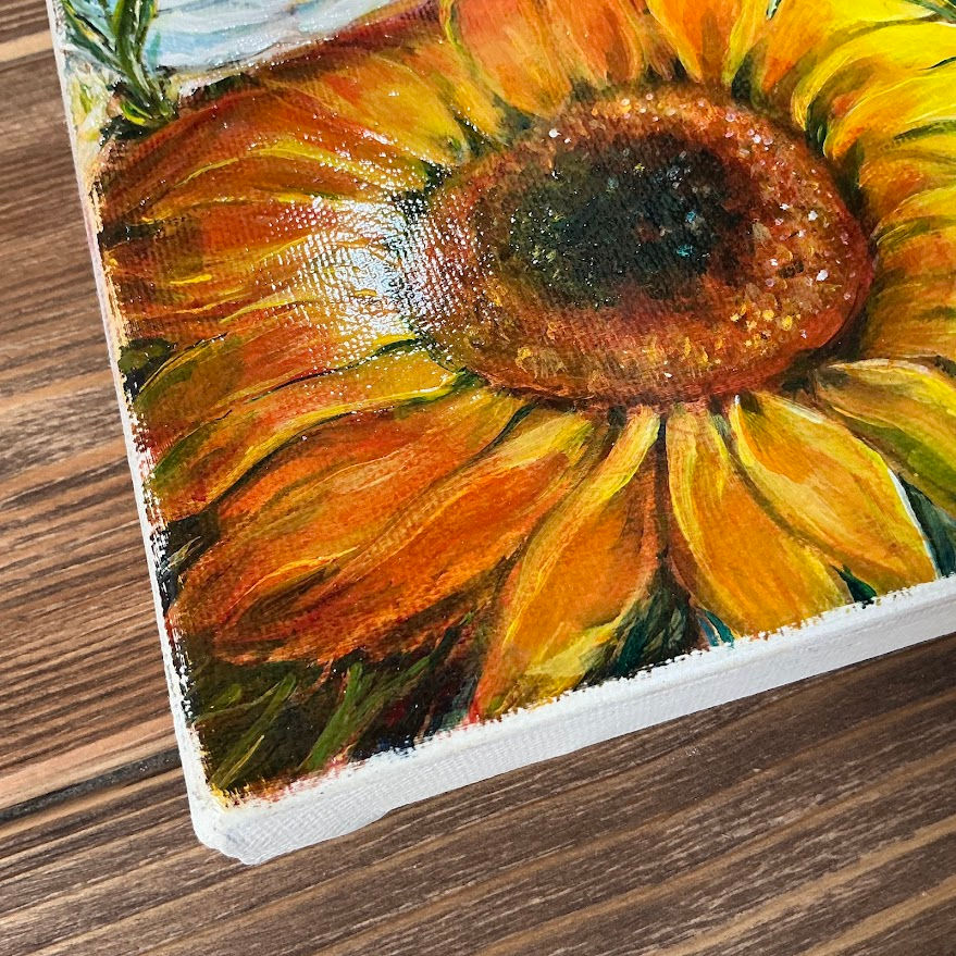 Thumbnail: “Hand-painted acrylic artwork of bright sunflowers surrounded by meadow blooms, vibrant brushstrokes, and textured details