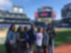 Lisa Marzullo with friends and family on the sideline of Citifield, home of the New York Mets