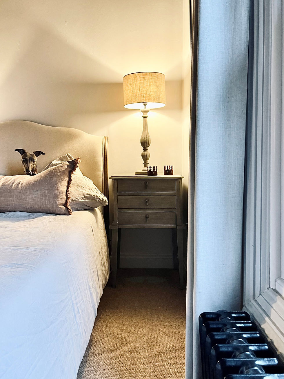 Pair of elegant bedside tables with a subtly distressed grey finish, three compact drawers, tapered slender legs