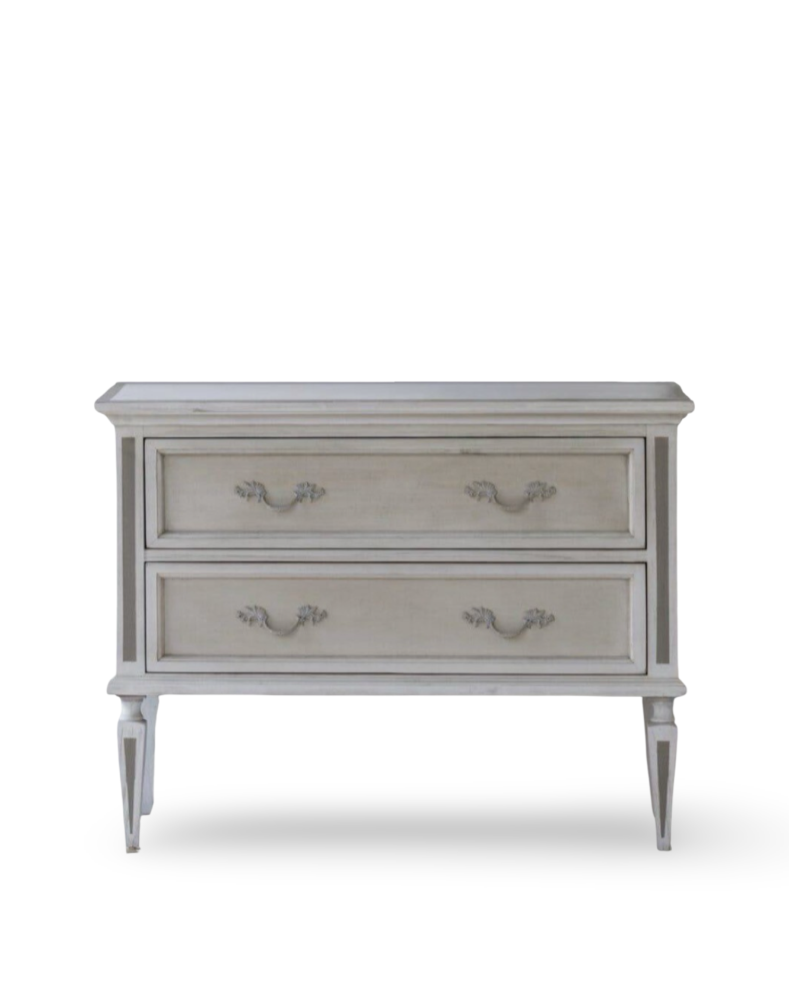 Swedish-inspired chest of drawers with a subtle grey facade, bold border detailing, and elegant fluted legs in a lightly rust