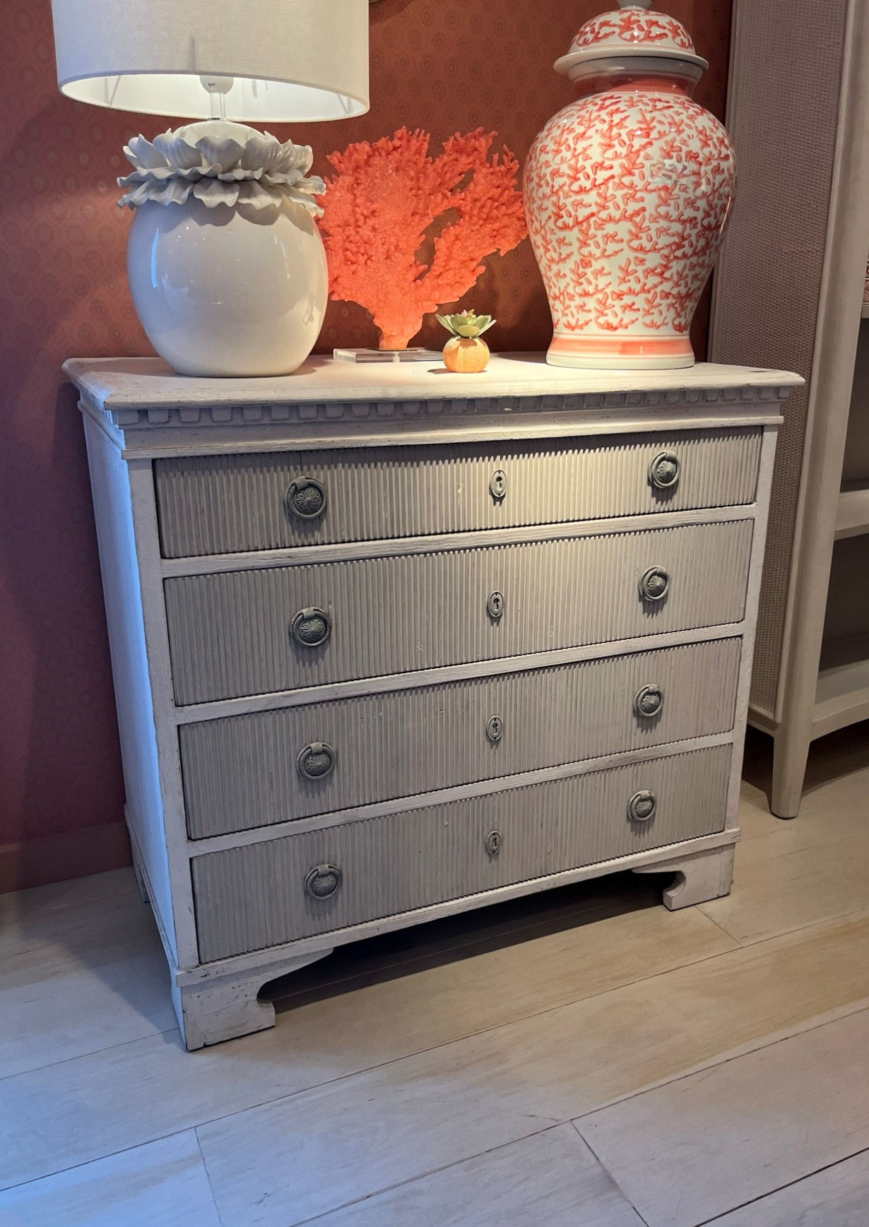 Gustavian four drawer chest made from reclaimed pine with a softly chalked white finish and elegant reeded front.