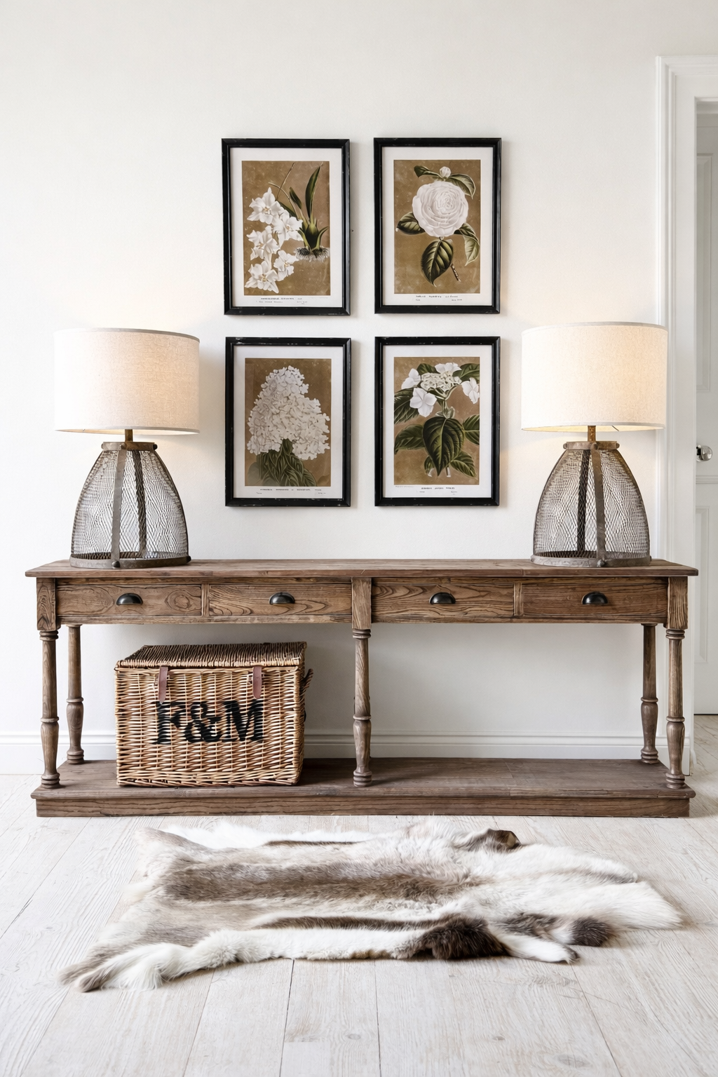“Large farmhouse console table made from reclaimed elm wood, featuring four drawers and a long, slim design