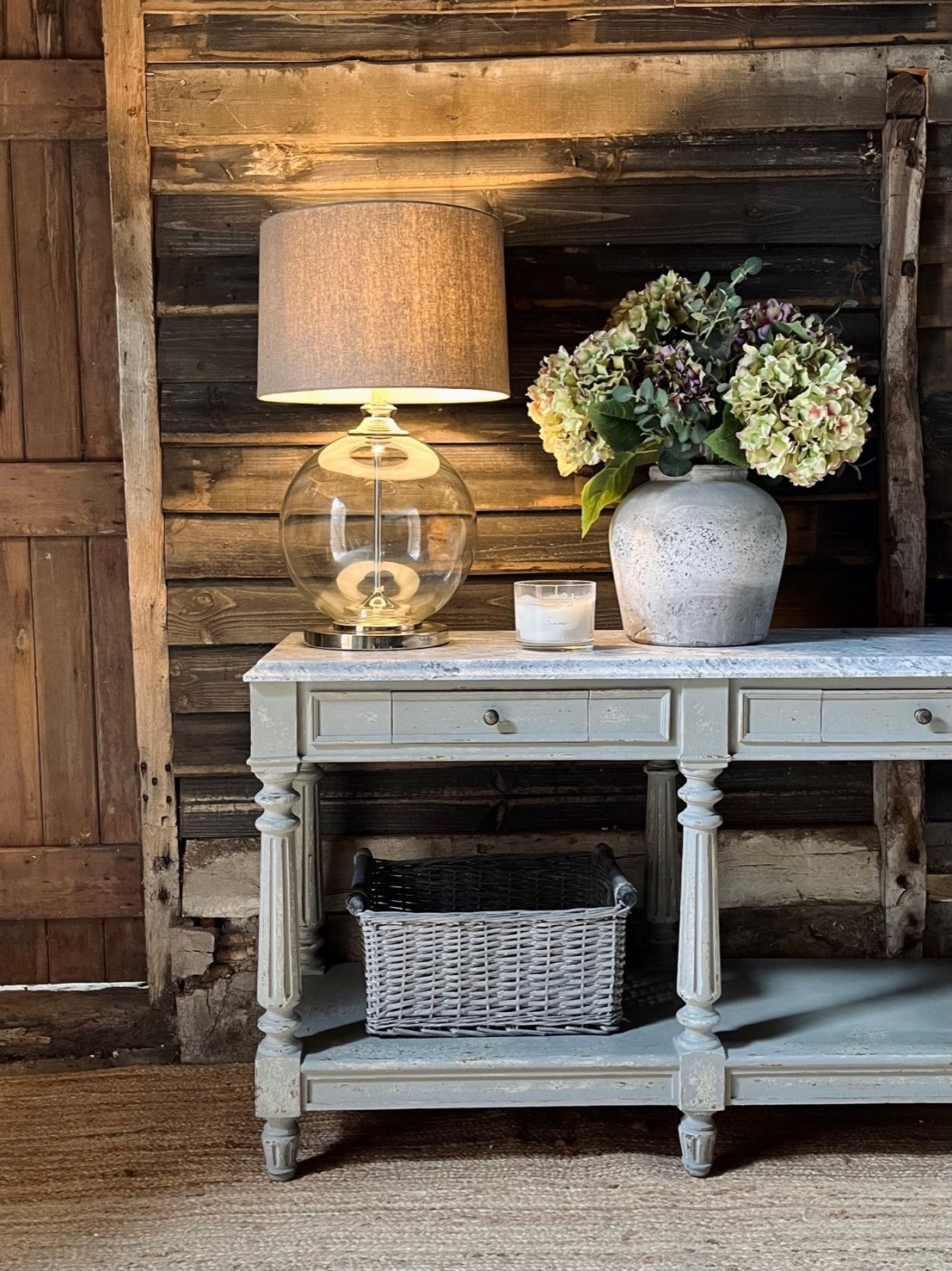 Rustic dove grey console with chunky stone top, featuring timeless design and part of a limited “rare finds collection