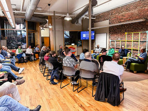 Panelists and the audience at the AI at a Crossroads event at the Knoxville Entrepreneur Center