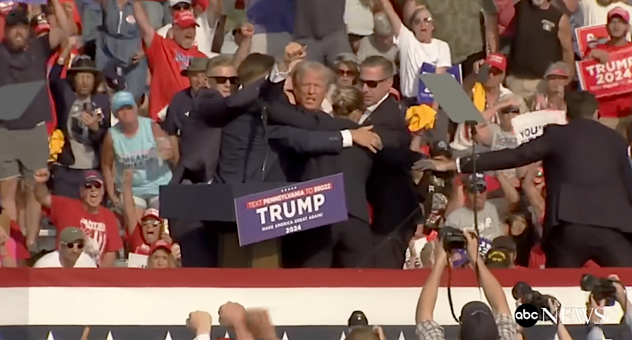 Donald Trump after being shot in the ear at a campaign event in 2014.