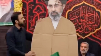 A cardboard cutout of Mojtaba Khamenei.
