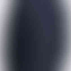 Back view of a man wearing a navy striped shirt with a collar and button cuffs. 