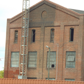 Cleaning the Hercules Building with Brick Cleaner