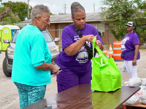 Our Team Celebrates Community with Free Food Distribution Event in Sistrunk