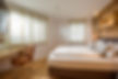 Strasser-Appartement-Almhuette-Schlafzimmer_1.jpg