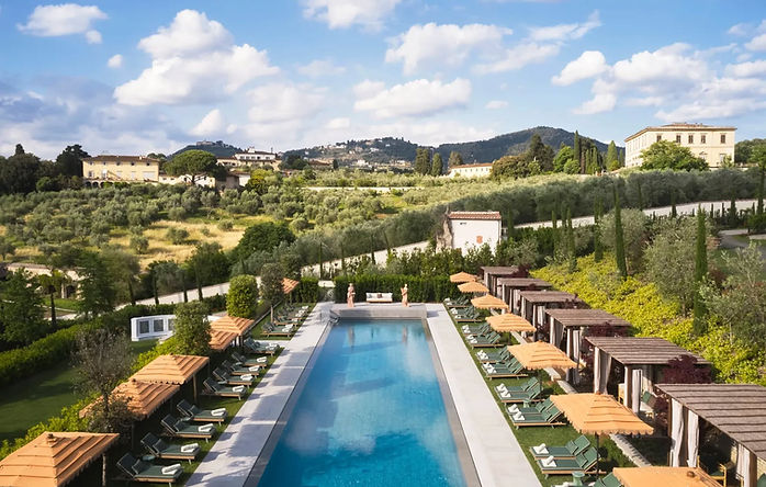 pool at the Collegio alla Querce hotel in Florence overlooking lush Tuscan hills and villas