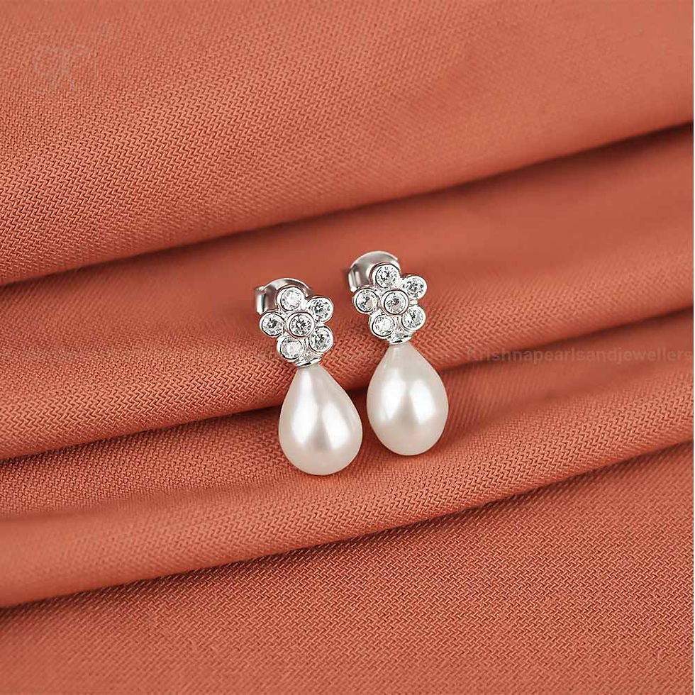 Thumbnail: blossom earrings hyderabad