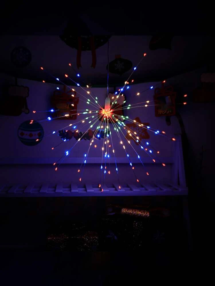 multicolored light sparkler that resembles a firework burst