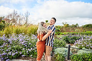 Happy couple embracing in a garden