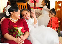 Happy mother and daughter at a party
