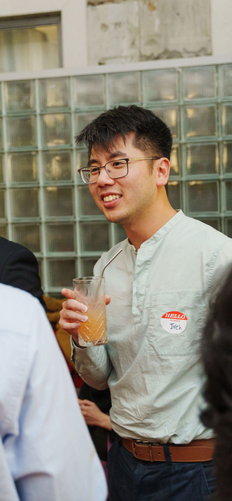 Man smiling at corporate event