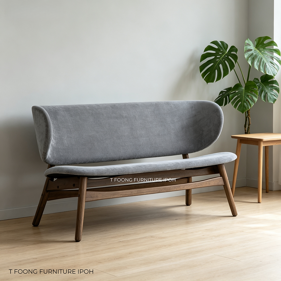 Grey curved loveseat with wood frame in a modern room.