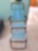 Blue folding recliner chair with footrest