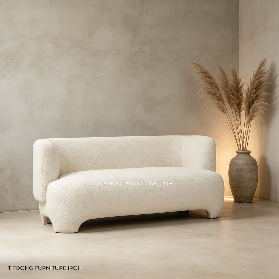 Curved cream boucle sofa in a minimalist living room