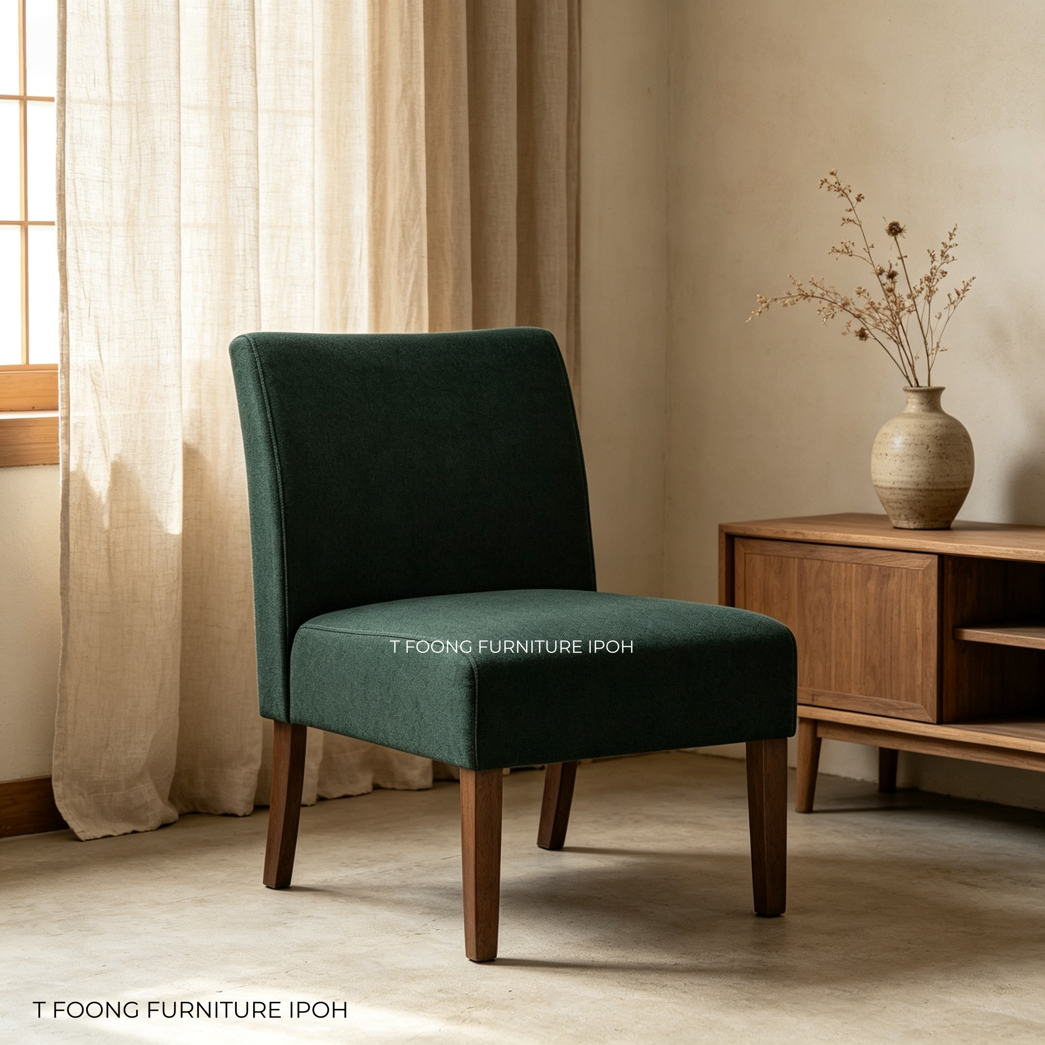 Green curved accent chair near Avalon mid-century sideboard