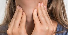 Woman experiencing fatigue and brain fog associated with hypothyroidism (underactive thyroid)