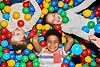 three-happy-kids-playing-in-ballpit-2023-11-27-04-58-12-utc.png