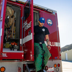 A CCC Corpsmember exits the Toro Fire Crew Bus.